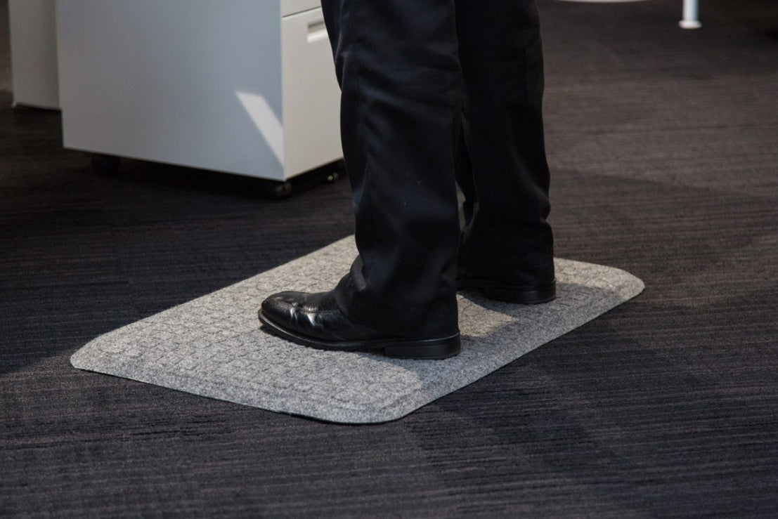 Energise ergonomic desk mat in Granite Grey carpet finish in office setting