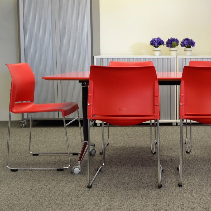 Red Envy chairs in a boardroom setting